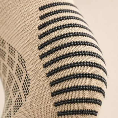 Close-up of the ribbed grip texture and knit fabric